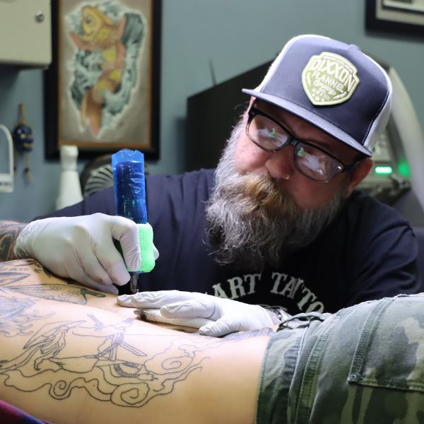 raymond tattoo artist